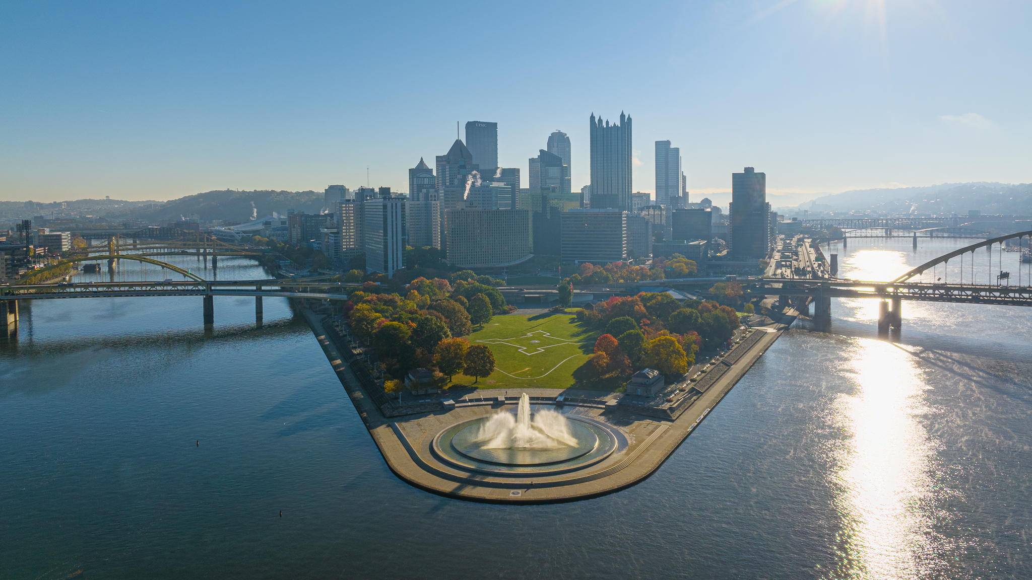 Point State Park in autumn with fountain and Pittsburgh skyline